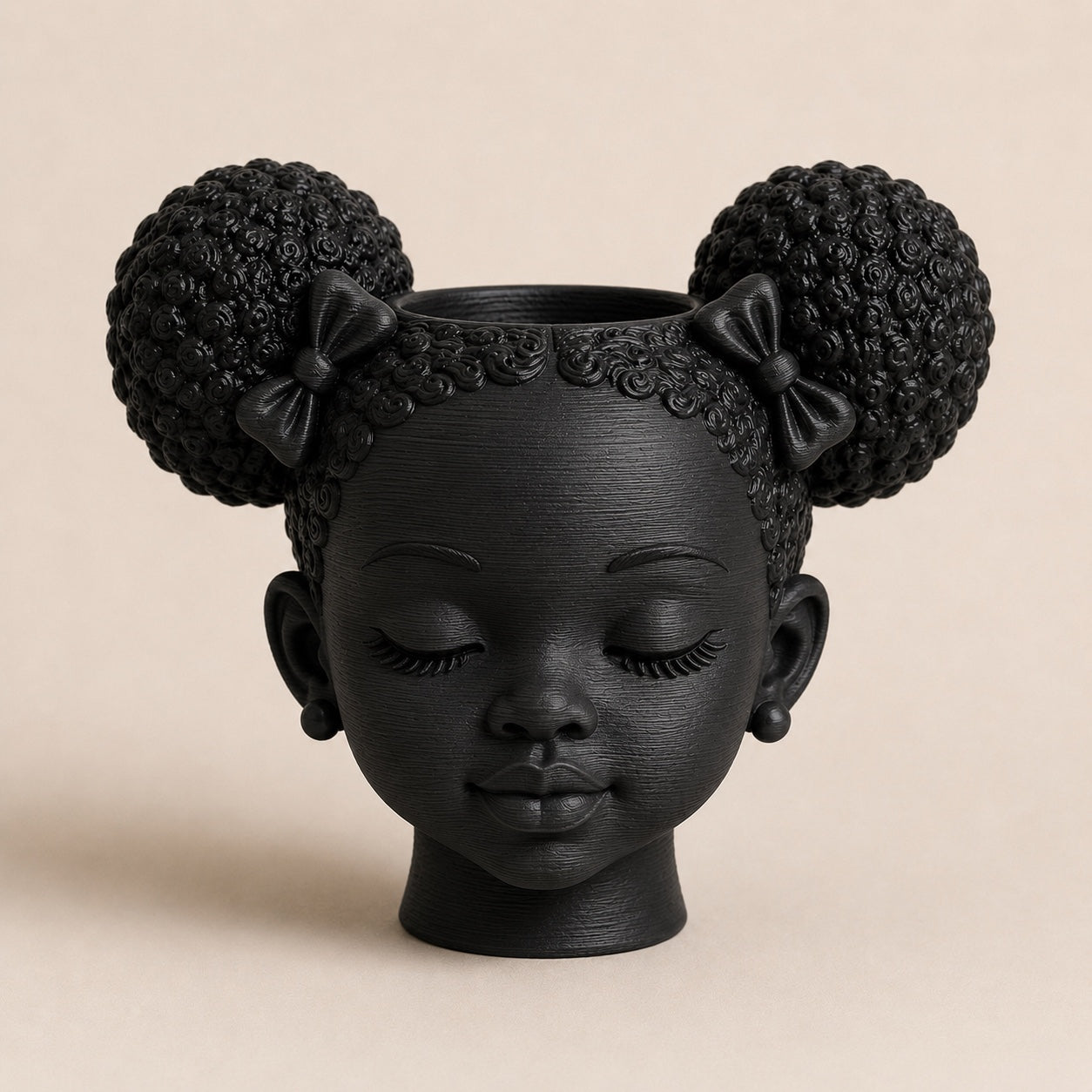 Afrocentric twin puff planter with natural hair puffs and bows