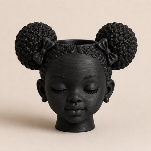 Afrocentric twin puff planter with natural hair puffs and bows